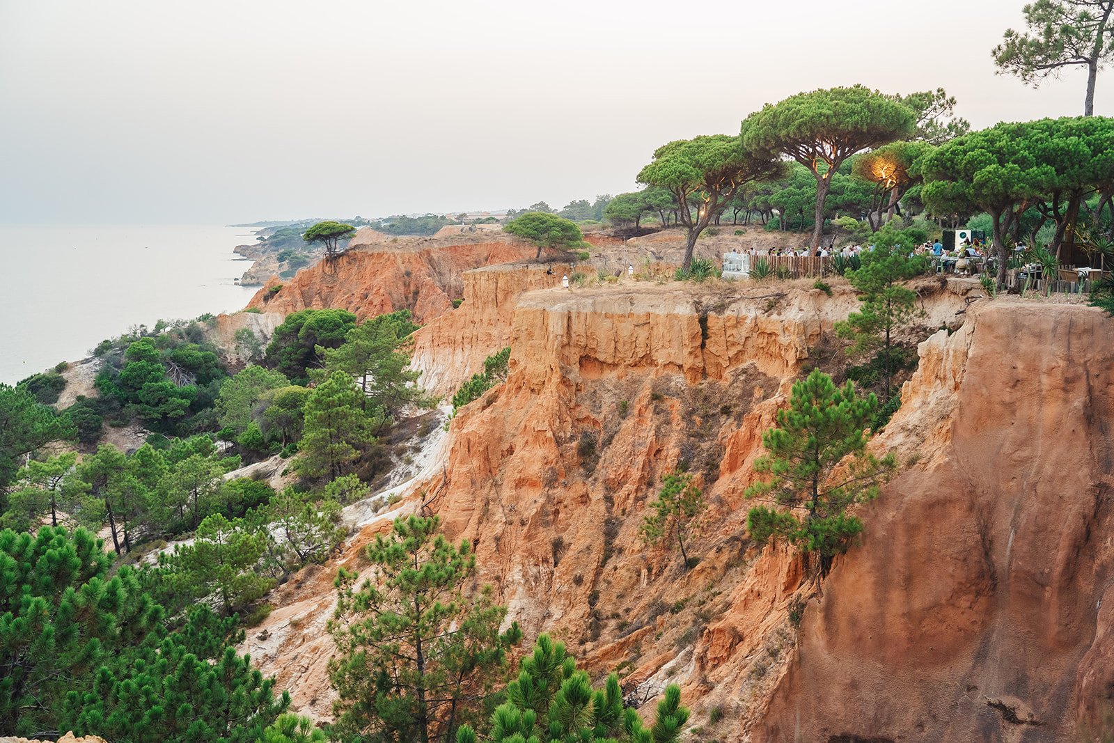 Red-orange cliffs at Praia da Falésia stretching into the distance, Albufeira