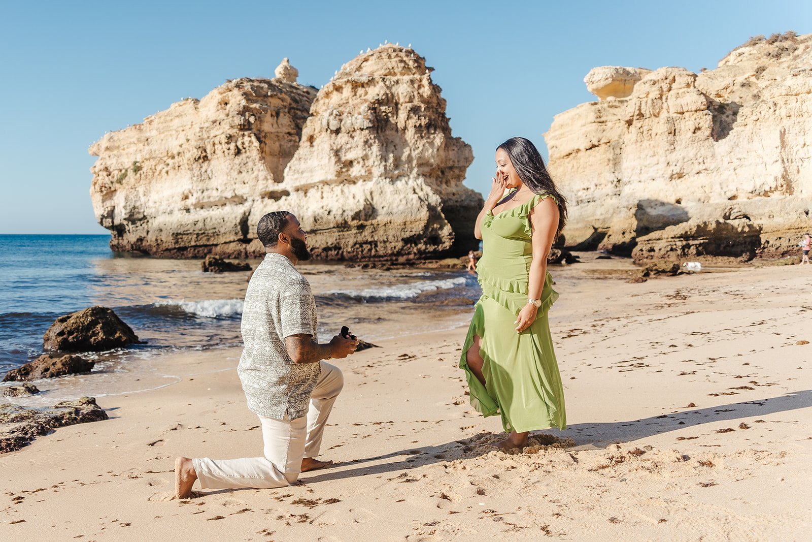 Surprise proposal photographer in Algarve, Praia Marinha beach