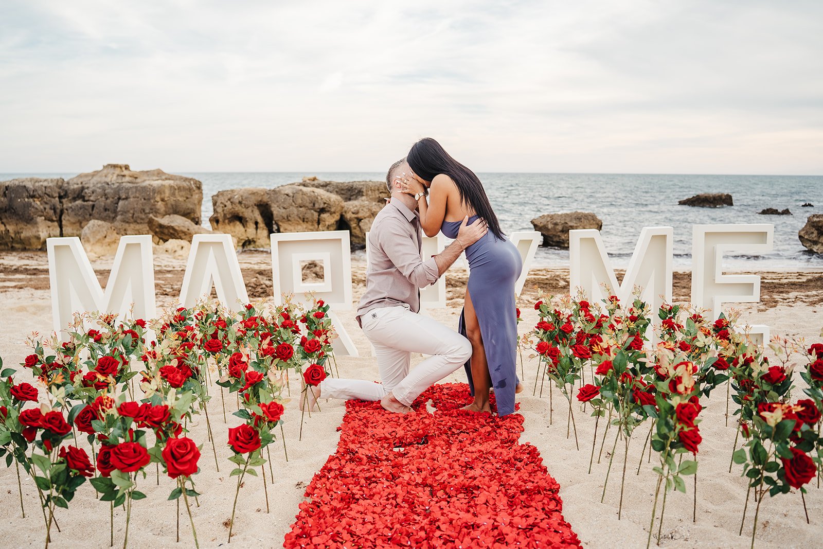 Sunset Surprise proposal photoshoot at Evaristo beach near W Algarve in Albufeira, Portugal