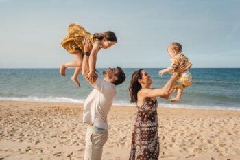 Algarve vacation photoshoot Happy family portrait on Algarve seaside