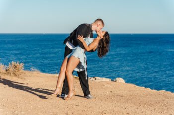 Vila Alba surprise proposal, Clifftop Surprise proposal photographer in Algarve. Couple kissing on clifftop overlooking the ocean, just engaged Vila Alba surprise proposal, Clifftop Surprise proposal photographer in Algarve. Couple kissing on clifftop overlooking the ocean, just engaged