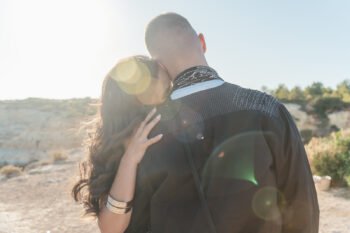Vila Alba surprise proposal, Clifftop Surprise proposal photographer in Algarve. Couple kissing on clifftop overlooking the ocean, just engaged Vila Alba surprise proposal, Clifftop Surprise proposal photographer in Algarve. Couple kissing on clifftop overlooking the ocean and sunset, just engaged
